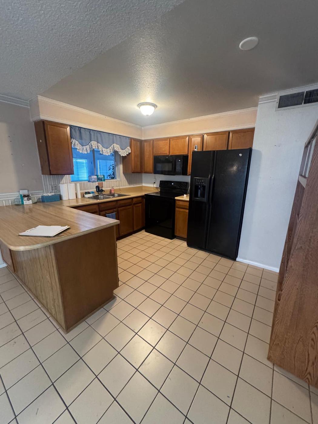 Kitchen remodel: new countertop and floor — Before